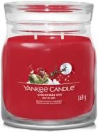 Свеча ароматическая Yankee Candle Christmas Eve (Сочельник) Medium (1631837E)