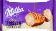 Круассан Milka снизу глазированный и сверху декорированный молочным шоколадом с начинкой со вкусом ванили 50 г Круассан Milka снизу глазированный и сверху декорированный молочным шоколадом с начинкой со вкусом ванили 50 г