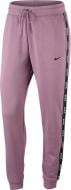Брюки Nike W NSW PANT LOGO TAPE AR3074-515 р. XS розовый