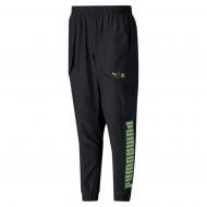 Брюки Puma Train FM Xtreme Woven Pant 51963701 р. S черный