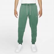 Брюки Nike M NSW JSY PANT WASH REVIVAL DA7162-337 р. S зеленый