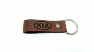 Брелок шкіряний TERRAPLUS Стрічка Kia коричневий з тисненням без кольору