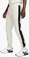 Брюки Nike FN0246-104 р. S бежевый