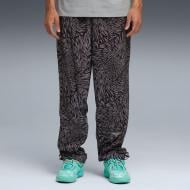 Брюки Puma Lamelo X Melo World Woven Pant 63462901 р. M разноцветный