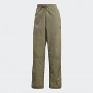 Брюки Adidas W woven pant FI6718 р. M зеленый