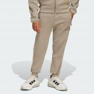 Брюки Adidas J Z.N.E. PT JD0007 р. 15-16YRS зеленый