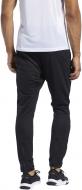 Брюки Reebok WOR KNIT PANT FJ4057 р. S черный Брюки Reebok WOR KNIT PANT FJ4057 р. S черный