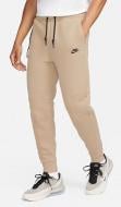 Брюки Nike M NK TCH FLC JGGR FB8002-247 р. XL бежевый Брюки Nike M NK TCH FLC JGGR FB8002-247 р. XL бежевый
