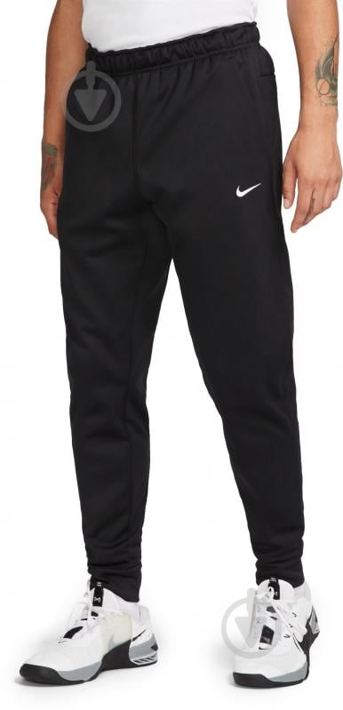 Штани Nike NK TF PANT TAPER DQ5405-010 р. M чорний - фото 1