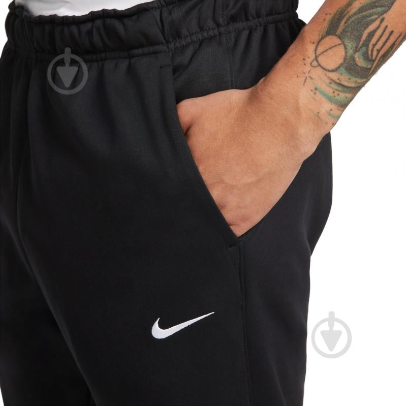 Штани Nike NK TF PANT TAPER DQ5405-010 р. M чорний - фото 3