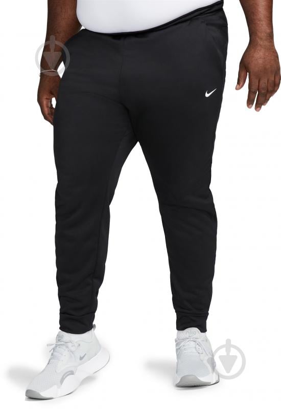 Штани Nike NK TF PANT TAPER DQ5405-010 р. M чорний - фото 7