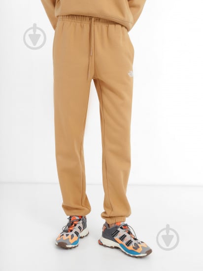 Брюки THE NORTH FACE W ESSENTIAL JOGGER NF0A7ZJFI0J1 р. L бежевый - фото 1