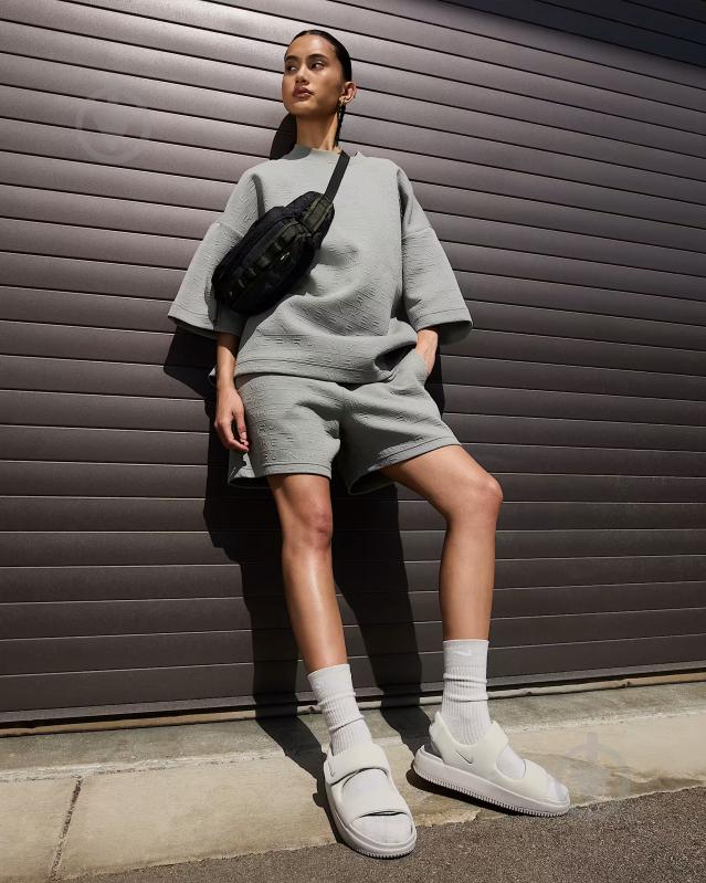 Шлепанцы Nike Calm FJ6043-002 р.36,5 бежевый - фото 10 Шлепанцы Nike Calm FJ6043-002 р.36,5 бежевый - фото 10