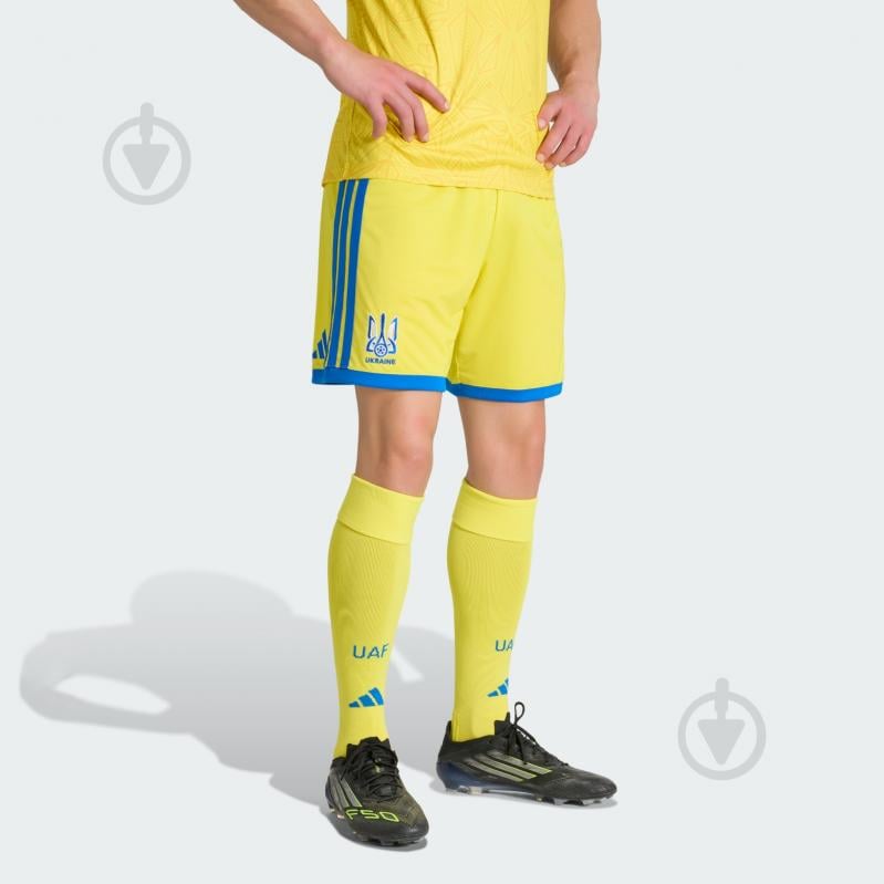 Шорты Adidas UAF Shorts JZ4625 р. XL желтый - фото 1 Шорты Adidas UAF Shorts JZ4625 р. XL желтый - фото 1