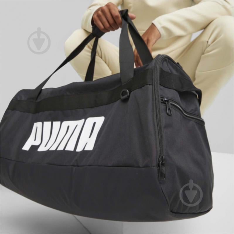 Спортивна сумка Puma CHALLENGER DUFFEL BAG M 07953101 58 л чорний - фото 4