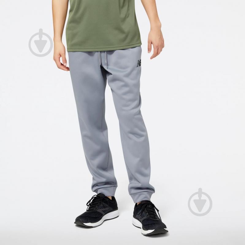 Штани New Balance TENACITY PERFORMANCE FLEECE PANT MP23022GNM р. M сірий - фото 1