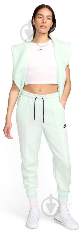 Брюки Nike W NSW TCH FLC R JGGR FB8330-394 р. XS зеленый - фото 8