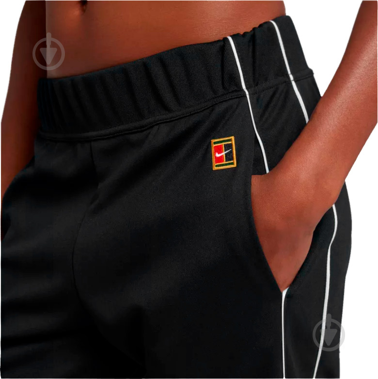 Штани Nike W NKCT WARM UP PANT AV2456-010 р. M чорний - фото 3