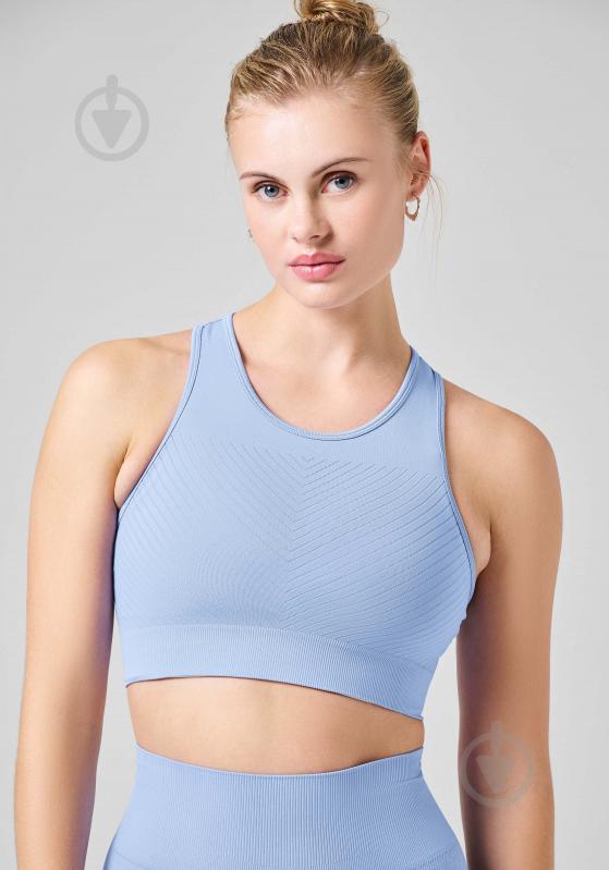 Бра жін.  р.M блакитний 22114-479 ESSENTIAL BLOCK SEAMLESS SPORT TOP BREEZE BLUE,S Casall SS24 - фото 1