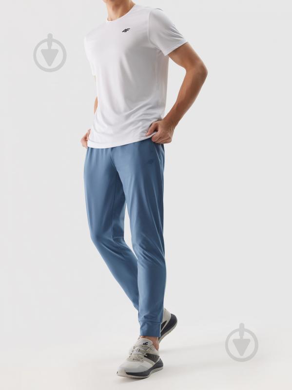 Штани 4F TROUSERS FNK M452 4FWSS24TFTRM452-32S р. L синій - фото 2