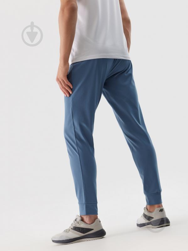 Штани 4F TROUSERS FNK M452 4FWSS24TFTRM452-32S р. L синій - фото 5