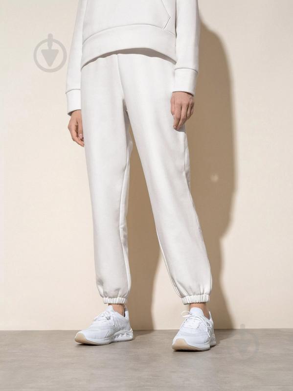 Штани 4F AL*4F_TROUSERS CAS 4FSS22TTROF084-11S р. XL білий - фото 1