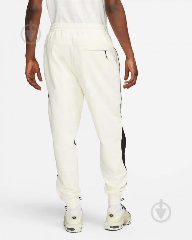 Штани Nike M NK SWOOSH FLC PANT DX0564-113 р. L бежевий - фото 1