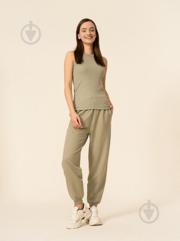 Штани Outhorn TROUSERS CAS F183 OTHSS23TTROF183-47S р. S зелений - фото 1