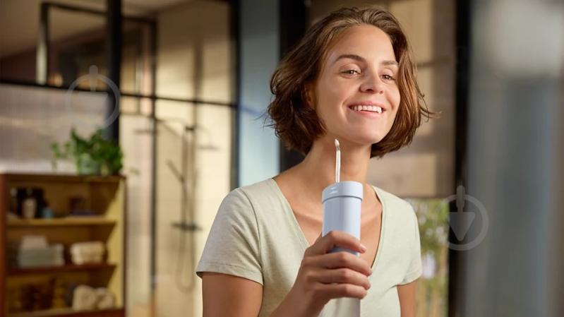 Ирригатор Philips Sonicare HX3333/24 Compact Flosser 1000 - фото 6