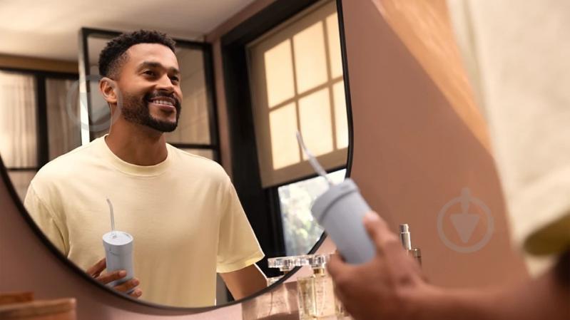 Ирригатор Philips Sonicare HX3333/24 Compact Flosser 1000 - фото 7