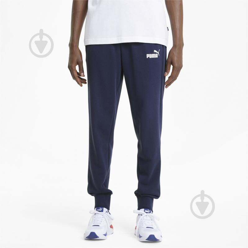 Брюки Puma ESS LOGO PANTS TR CL 58671606 р. S синий - фото 1