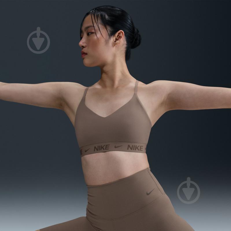 Бра Nike W NK DF INDY LGT SPT BRA FD1062-233 р.M коричневий - фото 11 Бра Nike W NK DF INDY LGT SPT BRA FD1062-233 р.M коричневий - фото 11