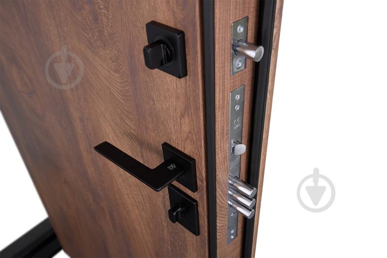 Двері вхідні Abwehr КС (585+0) 086L (СДК)+ (СДК) спил дерева коньячний 2050х860 мм ліві - фото 6 Двері вхідні Abwehr КС (585+0) 086L (СДК)+ (СДК) спил дерева коньячний 2050х860 мм ліві - фото 6