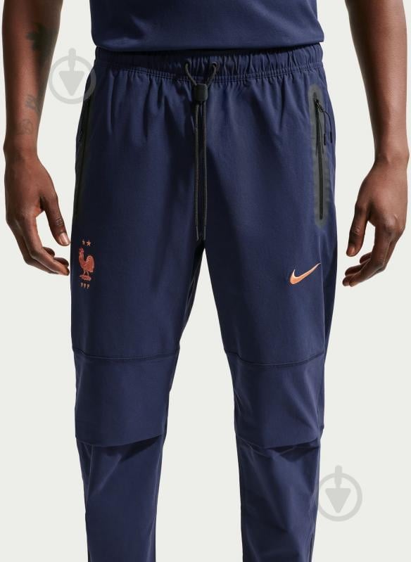 Штани Nike FFF M TECH WOVEN PANT IO0601-498 р. M блакитний - фото 4