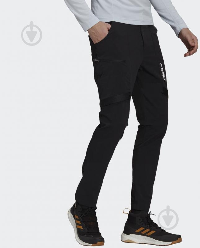 Брюки Adidas GI7308 р. 46 черный - фото 1