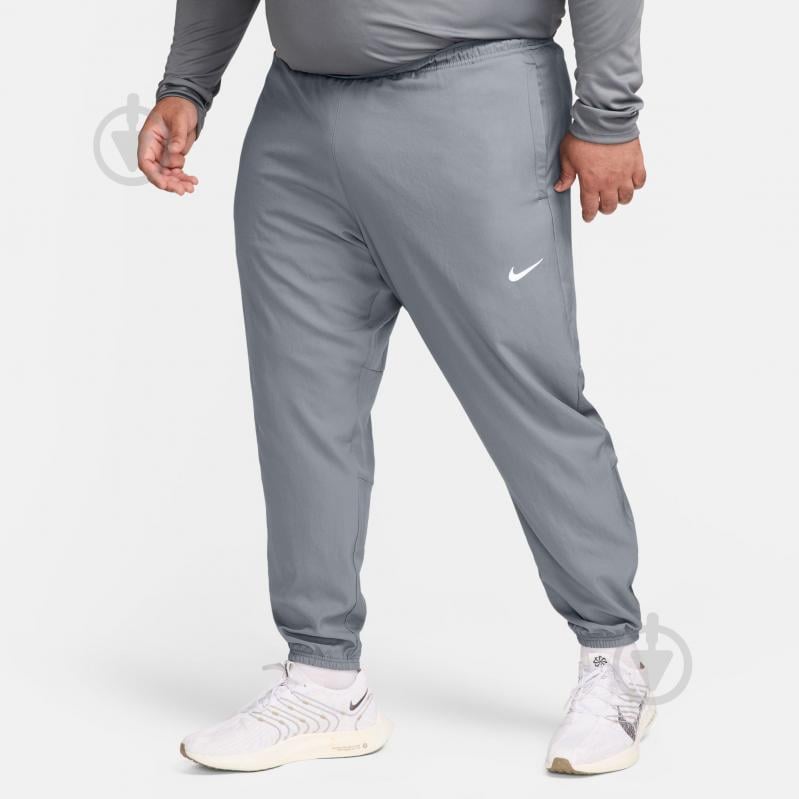 Брюки Nike M NK DF CHALLENGR WVN PANT FQ4780-084 р. XL серый - фото 5 Брюки Nike M NK DF CHALLENGR WVN PANT FQ4780-084 р. XL серый - фото 5