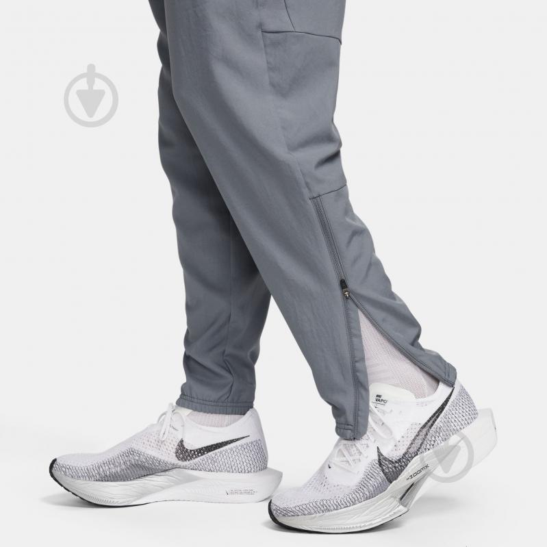 Брюки Nike M NK DF CHALLENGR WVN PANT FQ4780-084 р. L серый - фото 12 Брюки Nike M NK DF CHALLENGR WVN PANT FQ4780-084 р. L серый - фото 12