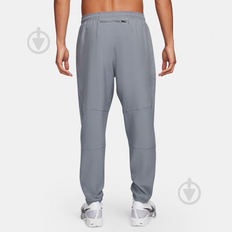Брюки Nike M NK DF CHALLENGR WVN PANT FQ4780-084 р. M серый - фото 2 Брюки Nike M NK DF CHALLENGR WVN PANT FQ4780-084 р. M серый - фото 2
