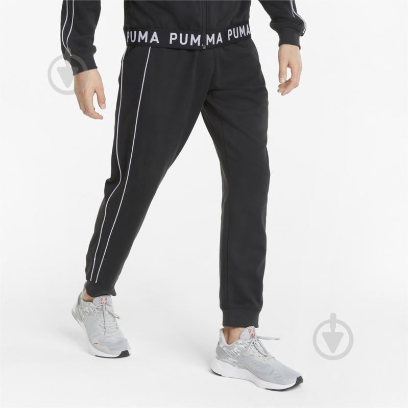 Брюки Puma TRAIN KNIT JOGGER 52183701 р. L черный - фото 1