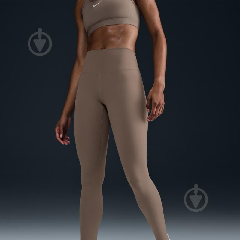 Лосини Nike W NK DF ONE HR TIGHT FN3226-233 р.L коричневий - фото 11 Лосини Nike W NK DF ONE HR TIGHT FN3226-233 р.L коричневий - фото 11