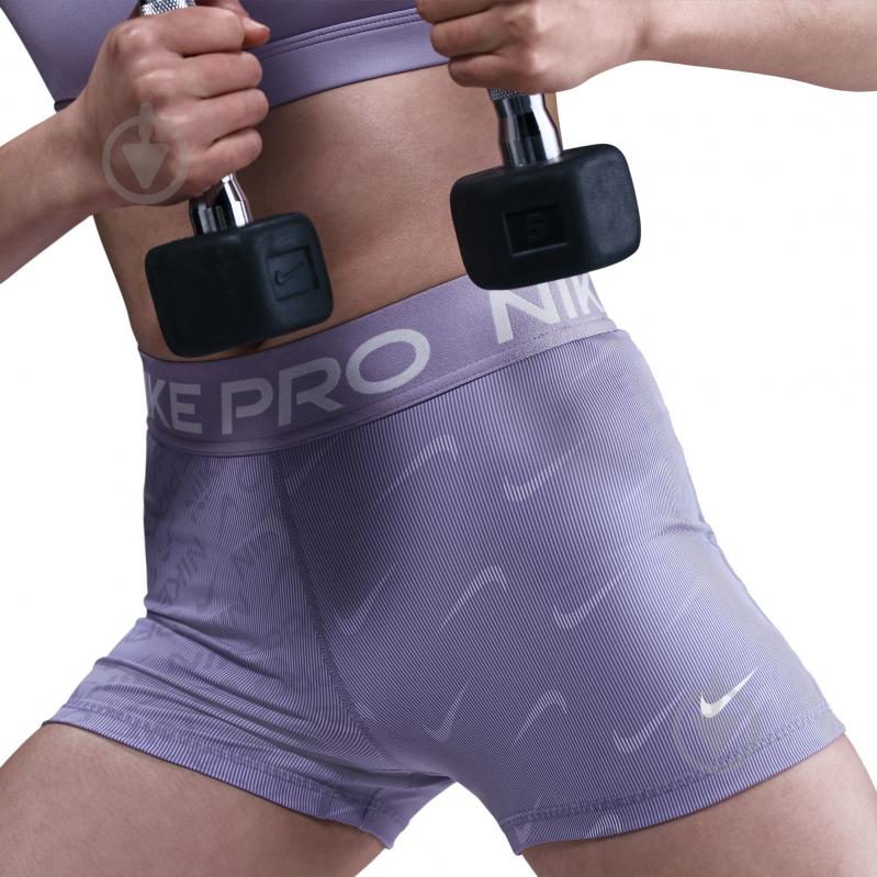 Лосини Nike W NP DF MR 3IN SHORT TT AOP HM6093-533 р.L фіолетовий - фото 4