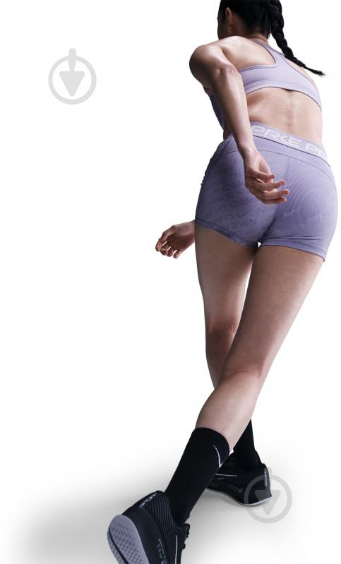 Лосини Nike W NP DF MR 3IN SHORT TT AOP HM6093-533 р.L фіолетовий - фото 6