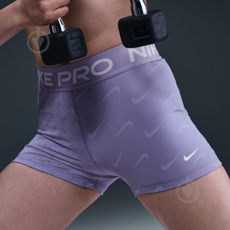 Лосины Nike W NP DF MR 3IN SHORT TT AOP HM6093-533 р.M фиолетовый - фото 9 Лосины Nike W NP DF MR 3IN SHORT TT AOP HM6093-533 р.M фиолетовый - фото 9