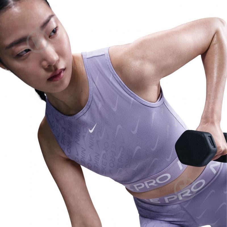 Топ Nike W NP DF CROP TANK AOP HQ5683-533 р.L фіолетовий - фото 4 Топ Nike W NP DF CROP TANK AOP HQ5683-533 р.L фіолетовий - фото 4