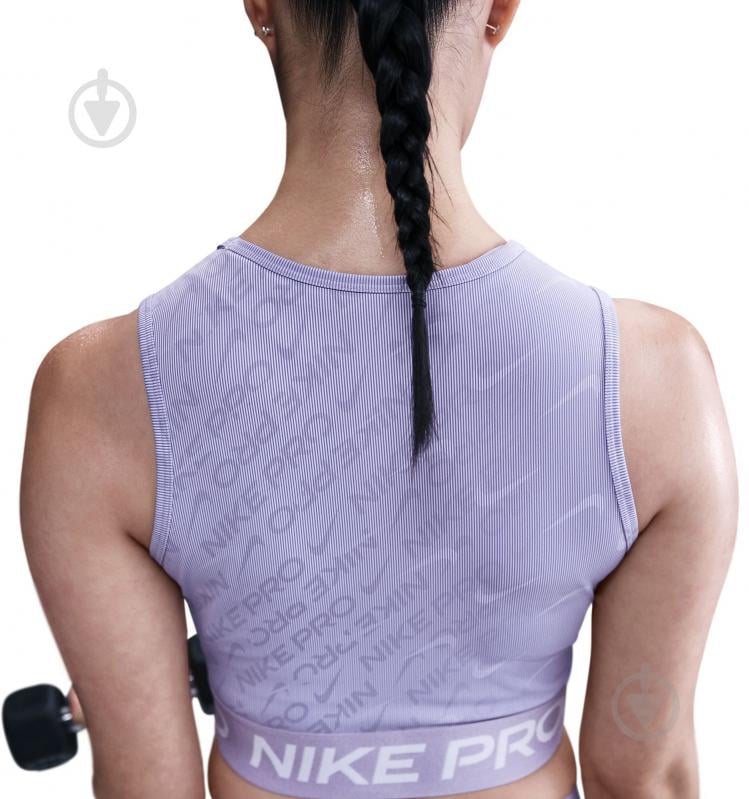 Топ Nike W NP DF CROP TANK AOP HQ5683-533 р.L фіолетовий - фото 5 Топ Nike W NP DF CROP TANK AOP HQ5683-533 р.L фіолетовий - фото 5