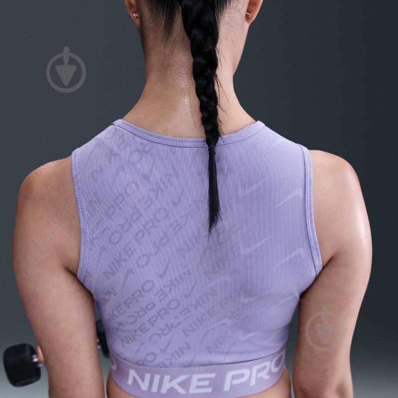 Топ Nike W NP DF CROP TANK AOP HQ5683-533 р.S фіолетовий - фото 10 Топ Nike W NP DF CROP TANK AOP HQ5683-533 р.S фіолетовий - фото 10
