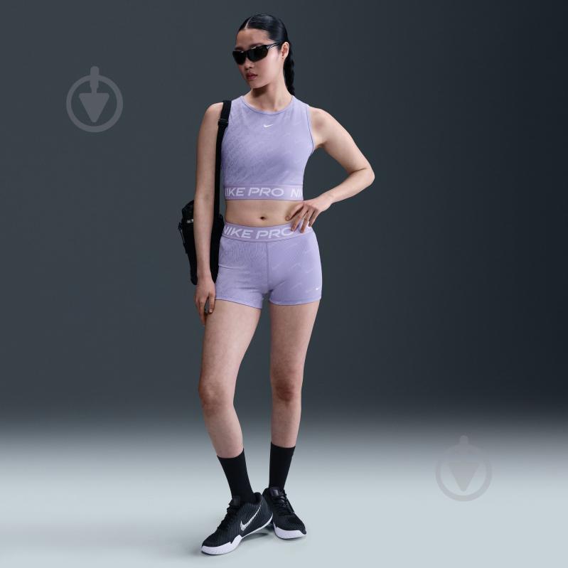 Топ Nike W NP DF CROP TANK AOP HQ5683-533 р.XL фіолетовий - фото 8 Топ Nike W NP DF CROP TANK AOP HQ5683-533 р.XL фіолетовий - фото 8