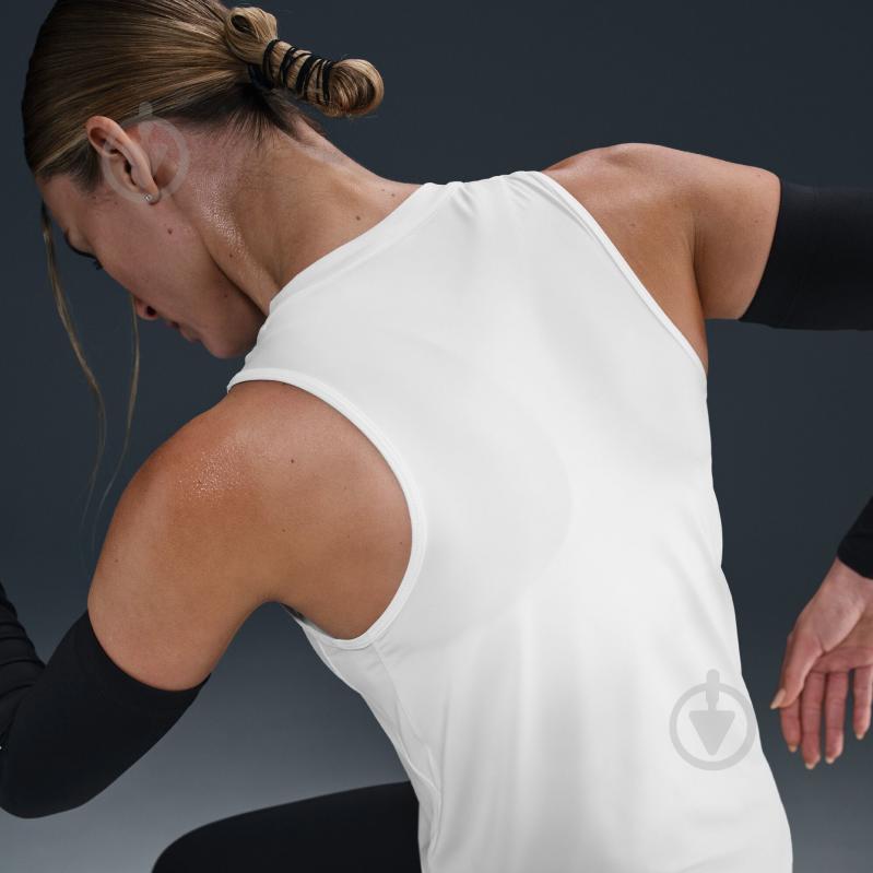 Майка Nike W NK ONE CLASSIC DF TANK WT IB9385-100 р.XL белый - фото 10 Майка Nike W NK ONE CLASSIC DF TANK WT IB9385-100 р.XL белый - фото 10