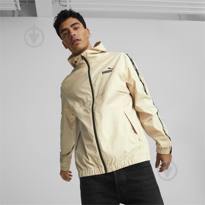 Ветровка мужская демисезонная Puma ESS+ TAPE WINDBREAKER 84747788 р.L бежевая - фото 3 Ветровка мужская демисезонная Puma ESS+ TAPE WINDBREAKER 84747788 р.L бежевая - фото 3