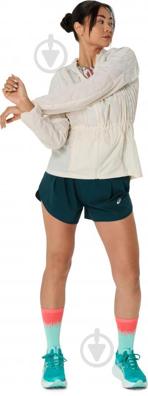 Куртка жіноча Asics ROAD PACKABLE JACKET 2012D076-200 р.L молочна - фото 10 Куртка жіноча Asics ROAD PACKABLE JACKET 2012D076-200 р.L молочна - фото 10